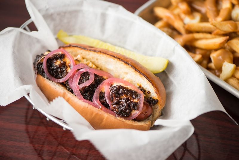 P.B.R. Dog with pimento cheese, bacon jam and pickled red onions. Photo credit- Mia Yakel.