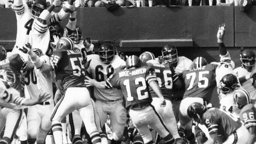 The Falcons’ Nick Mike-Mayer kicks a field goal against the Bears in the 1970s. AJC file photo