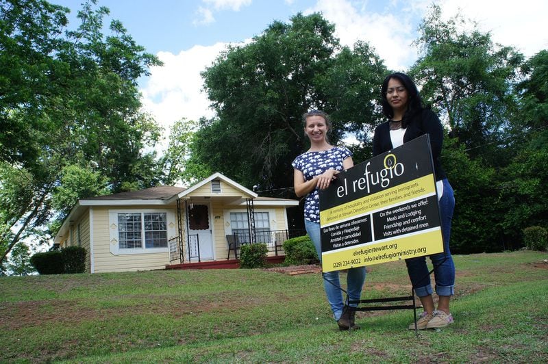 El Refugio volunteer Erica Schoon (left) stands in front of the house with Iris Abaca, who was staying overnight after visiting a friend in Stewart Detention Center. CONTRIBUTED BY WADE MARBAUGH