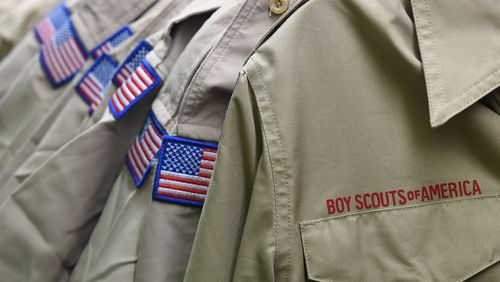 FILE - In this Feb. 18, 2020, file photo, Boy Scouts of America uniforms are displayed in the retail store at the headquarters for the French Creek Council of the Boy Scouts of America in Summit Township, Pa.   Nine sex-abuse lawsuits were filed Tuesday, May 19 2020, in upstate New York against three Boy Scout local councils, signaling an escalation of efforts to pressure councils nationwide to pay a big share of an eventual settlement in the Scoutsâ bankruptcy proceedings. The lawsuits were filed shortly after an easing of coronavirus lockdown rules enabled courts in some parts of New York to resume the handling of civil cases.  (Christopher Millette/Erie Times-News via AP, File)
