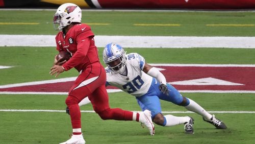 Arizona Cardinals quarterback Kyler Murray evades Detroit Lions cornerback Jeff Okudah (30) to scramble for a touchdown at State Farm Stadium in Glendale, Arizona, on Sept. 27, 2020. He'll be the focus of the Los Angeles Rams in a showdown game on Monday Night Football, Dec. 13, 2021. (Christian Petersen/Getty Images/TNS)