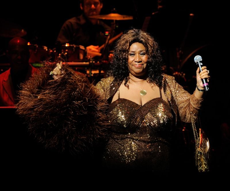 NEW YORK - JUNE 14:  Singer Aretha Franklin performs after she was inducted into the Apollo Legends Hall of Fame at the 2010 Apollo Theater Spring Benefit Concert & Awards Ceremony at The Apollo Theater on June 14, 2010 in New York City.  (Photo by Jemal Countess/Getty Images)