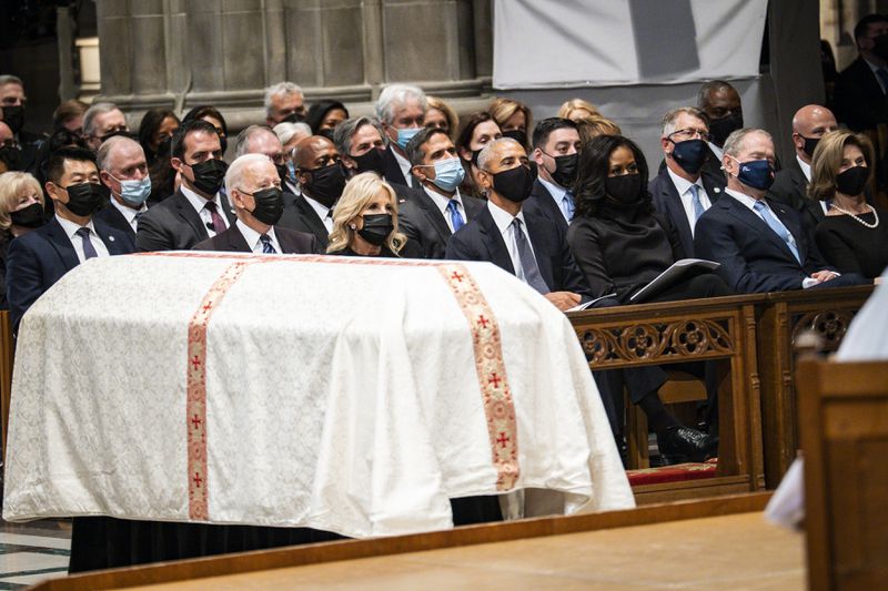 President Joe Biden, first lady Jill Biden, former President Barack Obama, former first lady Michelle Obama, former President George W. Bush and former first lady Laura Bush attend the funeral for former Secretary of State Colin Powell on Friday at the Washington National Cathedral. (Pete Marovich/The New York Times)