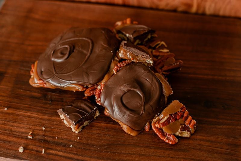 Ruckus Makers are Janna Tucker’s version of chocolate-pecan turtles. Her company now sells more than 10,000 of them a year. Courtesy of Julie Freeman Photography