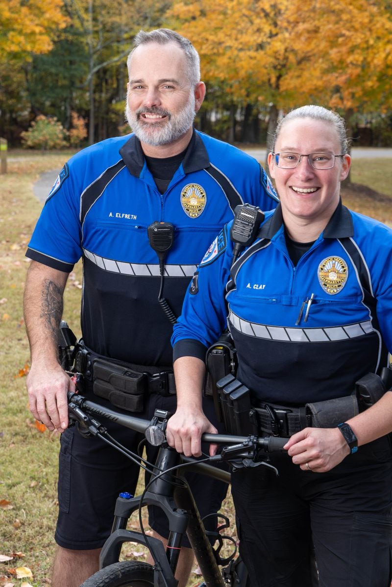 Portrait of Alpharetta Bike Patrol officers Allen Elfreth & Amanda Clay, at Wills Park, who run the iCan Bike camp in Alpharetta. For the Everyday Heroes holiday package. PHIL SKINNER FOR THE ATLANTA JOURNAL-CONSTITUTION