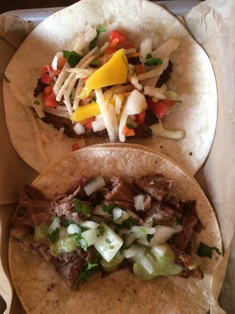 Lean Draft House’s tacos — like the blackened grouper with mango (top) and carnitas — pair nicely with the list of 20 local craft brews on tap. CONTRIBUTED BY WENDELL BROCK