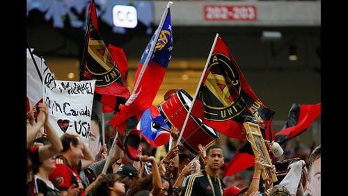 Fans watch the match between the Atlanta United and the Toronto FC at Mercedes-Benz Stadium on October 22, 2017 in Atlanta, Georgia. Photo: Kevin C. Cox, Getty Images</p>
