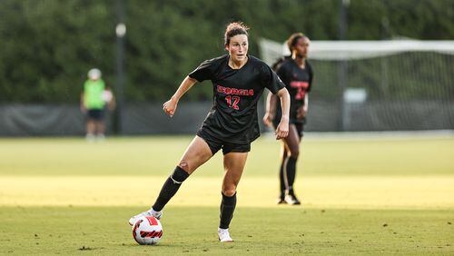 Georgia forward Mollie Belisle (12) dribbles in the open field during the Bulldogs’ match against Georgia State at Turner Soccer Complex in Athens on Thursday, Aug. 26, 2021. (Photo by Tony Walsh/UGA Athletics)
