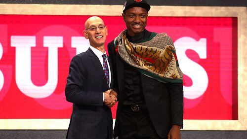 Wendell Carter Jr. poses with NBA Commissioner Adam Silver after being drafted seventh overall by the Chicago Bulls during the 2018 NBA Draft at the Barclays Center on June 21, 2018 in New York City.