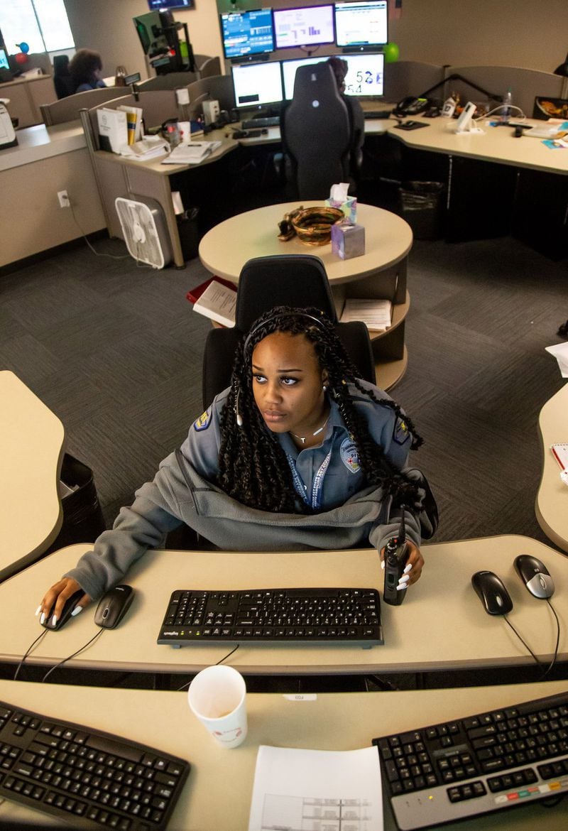 Dispatch operator Kelah Handley answers calls at a Sandy Springs 911 call center on Wednesday, April 17, 2019. STEVE SCHAEFER / SPECIAL TO THE AJC