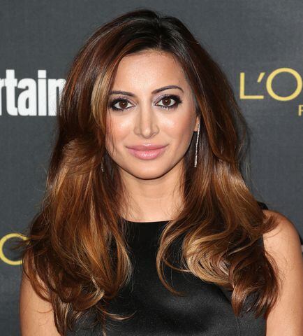 September: 'Anger Management' actress Noureen DeWulf announced she's expecting her first child with her husband, pro hockey player Ryan Miller.