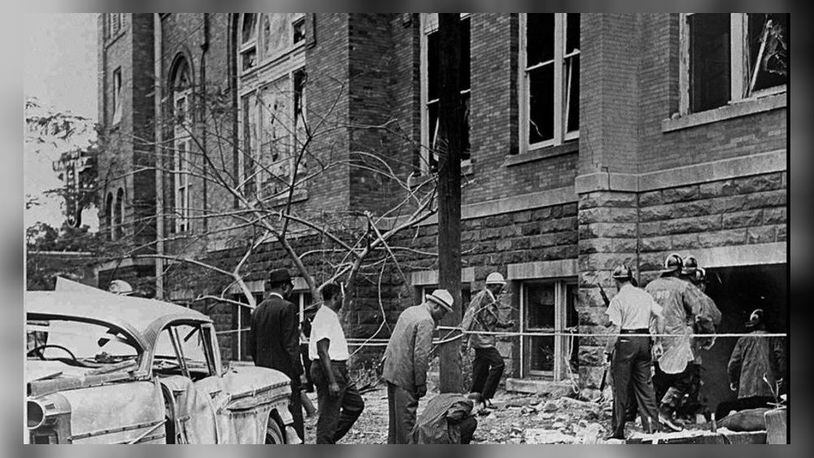 FILE--A copy of a 1963 file photo of the Sunday, Sept. 15, 1963, bombing of the 16th Street Baptist Church that killed Denise McNair, 11, Addie Mae Collins, Cynthia Wesley and Carole Robertson, all 14. The FBI has reopened its investigation into the 34-year-old bombing after conducting a year-long secret review of the case. (AP Photo/The Birmingham News, Tom Self, File)