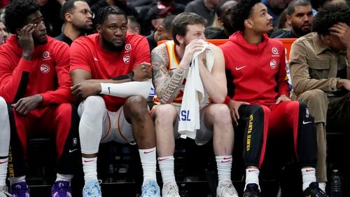 Atlanta Hawks players sit on the bench during the second half of the team's NBA basketball play-in tournament game against the Chicago Bulls in Chicago, Wednesday, April 17, 2024. The Bulls won 131-116. (AP Photo/Nam Y. Huh)