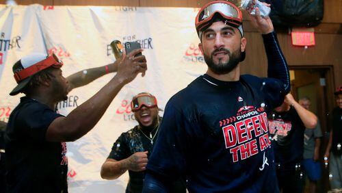 Nick Markakis celebrates after the Braves clinched the division title. (Photo by Daniel Shirey/Getty Images)