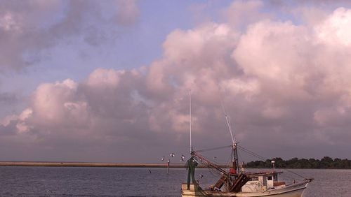A shrimp boat on the Apalachicola River at sunset. (Paul J. Milette/The Palm Beach Post)