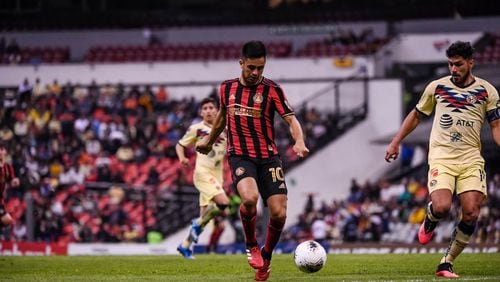 Atlanta United midfielder Gonzalo Martinez #10 dribbles the ball during the first half of the first leg match between Atlanta United FC and Club America in the quarterfinal round of the 2020 Scotiabank Concacaf Champions League at Estadio Azteca in Mexico City, Mexico, on Wednesday March 11, 2020. (Photo by Jacob Gonzalez/Atlanta United)