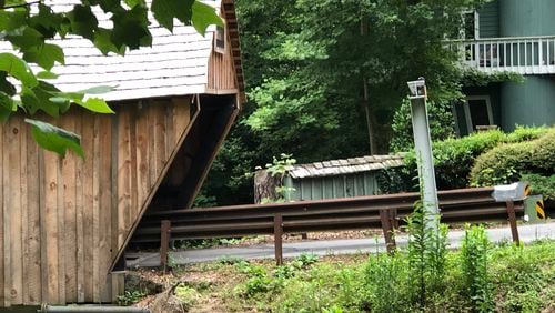 Cobb County is installing mast arms that will have chains and plastic-covered PVC pipes suspended at a seven-foot height, the same clearance for the Concord Road covered bridge.