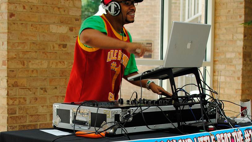 DJ Willy Wow spins dance tunes at Fernbank Museum of Natural History. Contributed by Fernbank Museum of Natural History