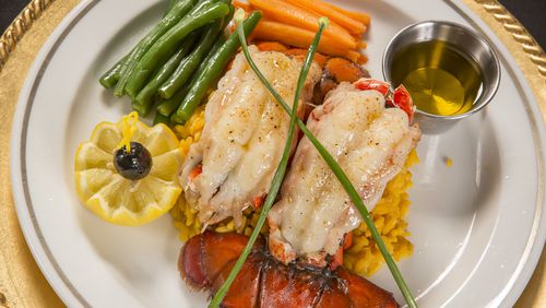 Indulge in a five-course, prix-fixe Valentine's Day dinner with broiled lobster tails and more at Petite Violette Restaurant. Photo credit: Randi Tucker.