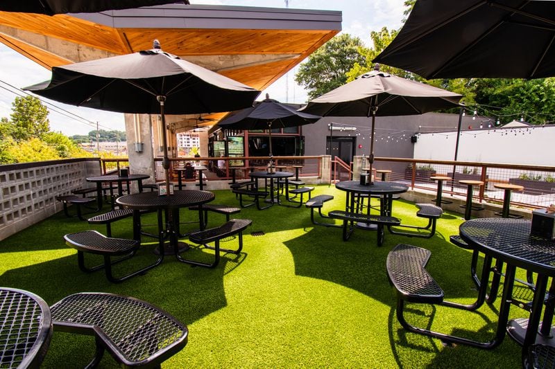 There’s a dog-friendly patio at the newest Grindhouse Killer Burgers on Memorial Drive. CONTRIBUTED BY HENRI HOLLIS