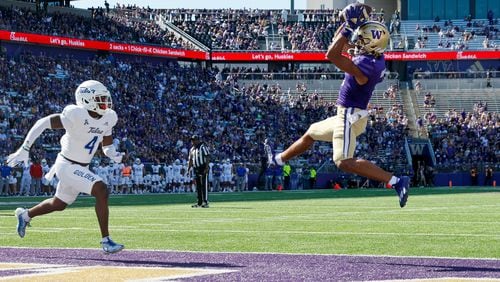 Washington wide receiver Rome Odunze, right, beats Tulsa cornerback Tyree Carlisle for a 2-yard touchdown catch during the first quarter at Husky Stadium on Saturday, Sept. 9, 2023, in Seattle. (Jennifer Buchanan/The Seattle Times/TNS)