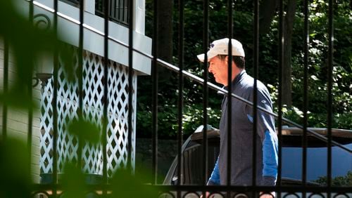 Former FBI Director James Comey walks at his home in McLean, Va., Wednesday, May 10, 2017. President Donald Trump fired Comey on Tuesday, ousting the nation's top law enforcement official in the midst of an investigation into whether Trump's campaign had ties to Russia's election meddling. (AP Photo/Sait Serkan Gurbuz)