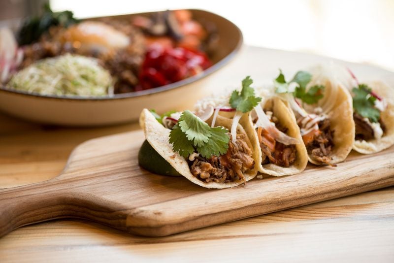 Punch Bowl Social’s Lil’ Street Tacos, with pork carnitas, can satisfy your hunger between games. CONTRIBUTED BY MIA YAKEL