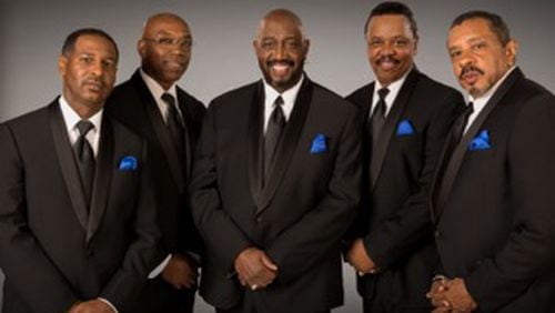The Temptations is still anchored by original member Otis Williams (center).