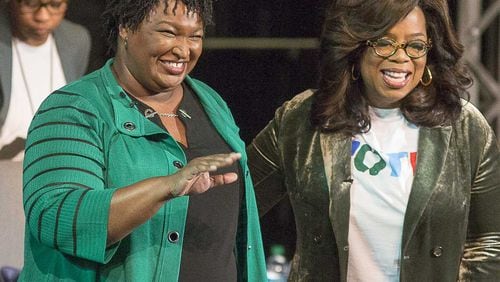 Oprah Winfrey, right, hosted a virtual campaign event with Georgia gubernatorial candidate Stacey Abrams, left, on  Wednesday. They are pictured at the Cobb Civic Center in 2020. (Alyssa Pointer/AJC)