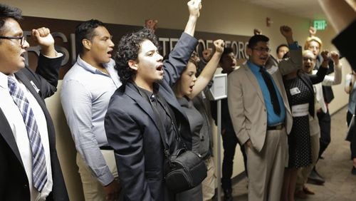 Students protested policies that require Deferred Action for Childhood Arrivals recipients to pay more expensive out-of-state tuition at Georgia’s public colleges during a 2016 state Board of Regents meeting. AJC FILE PHOTO