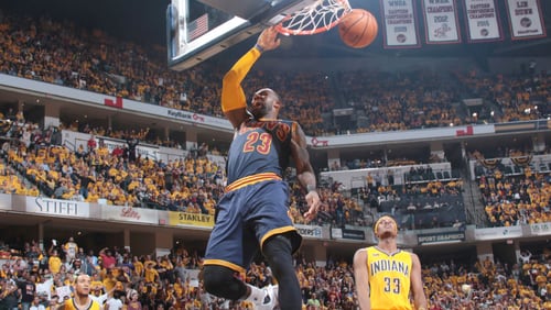LeBron James (23) of the Cleveland Cavaliers dunks against the Indiana Pacers during Game 3 of the Eastern Conference quarterfinals Thursday night.