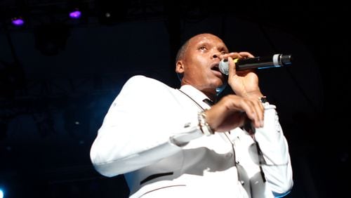 Ronnie DeVoe of the Eighties R&B boy band New Edition sings for their 30th anniversary reunion tour at Chastain Amphitheatre on Saturday, Sept. 2, 2012. Akili-Casundria Ramsess/Special to the AJC