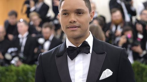 Trevor Noah will be host of “The Daily Show” through 2022. Contributed by Charles Sykes/Invision