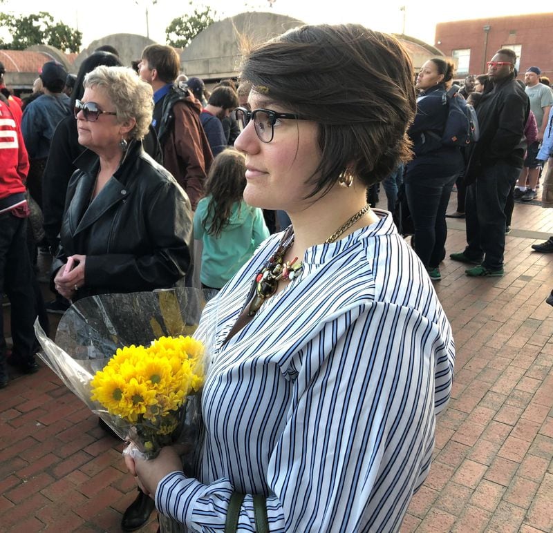 Darlin Lozano, who lives in Atlanta, came to the King Center on the 50th anniversary of Martin Luther King Jr.’s death to place flowers on his crypt.