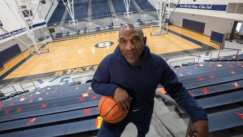 Keith Legree, the star player on the Statesboro high school’s 1991 State Championship team, has returned to take the place of his mentor coach Lee Hill. Hill’s death of COVID-19 in August 2020 has rocked the city and brought an end to his 44-year career at the school. (AJC Photo/Stephen B. Morton)