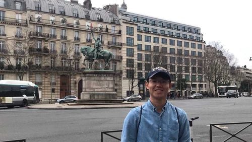 Emory University student Joey Ye, originally from China, enjoys traveling, which is part of the reason why he chose to enroll there. Ye visited Paris in December 2019. He returned to China at the start of the coronavirus pandemic and is taking courses at Emory remotely. (Courtesy of Joey Ye)