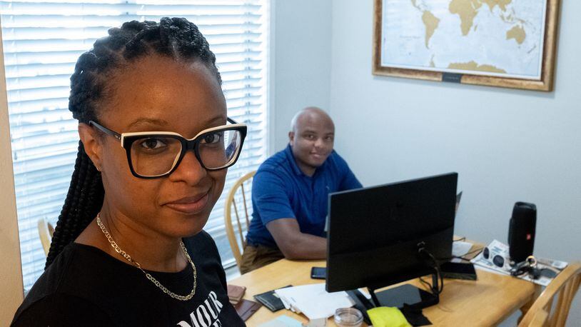 Renee Morris and Justin Nicks drastically scaled back the size of their upcoming wedding due to the coronavirus pandemic and are using the money they would have spent on their wedding to help buy a town home. (Ben Gray for The Atlanta Journal-Constitution)