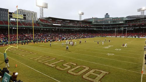 FILE - Boston College play SMU during the first half of the Fenway Bowl NCAA football game at Fenway Park Thursday, Dec. 28, 2023, in Boston. With the expanded College Football Playoff locked in through 2031, questions still remain about what the rest of the postseason will look like. One thing is certain, there will still be bowl games. (AP Photo/Winslow Townson, File)