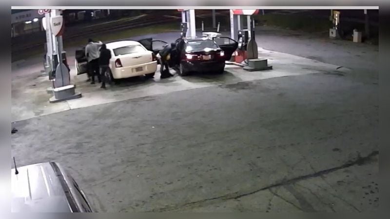Police are looking for three armed men who robbed a man outside a DeKalb County gas station and carjacked a woman seconds later at the same location.