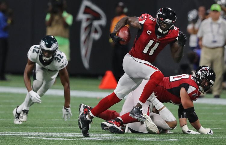 Photos: Falcons outlast Eagles for first win