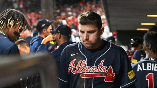 Atlanta Braves third baseman Austin Riley (27) reacts in the dugout after the Philadelphia Phillies posted a substantial lead through the seventh inning of NLDS Game 3 in Philadelphia on Wednesday, Oct. 11, 2023.   (Hyosub Shin / Hyosub.Shin@ajc.com)