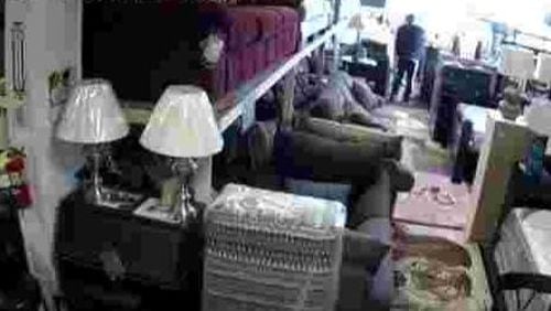 Video shows a man attempting to rob an Indianapolis furniture store.