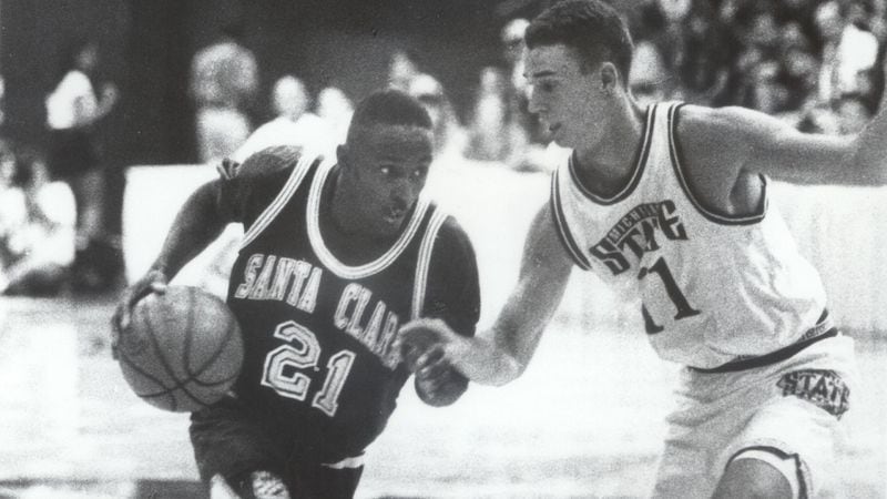 Lloyd Pierce, who agreed to a contract May 11, 2018 to become the Atlanta Hawks' next head coach, played for Santa Clara in the 1990s. Here he is in action as a sophomore when Santa Clara defeated Michigan State in the third-place game of the Maui Invitational on Nov. 22, 1995. Michigan State coach Tom Izzo was coaching his third game for the Spartans. (Photo courtesy of Santa Clara University.)