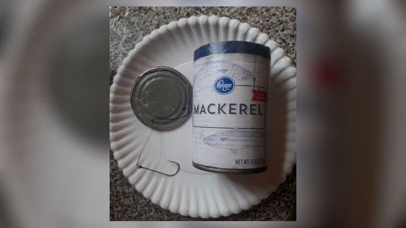 A man said a can of Kroger-brand mackerel that he bought in Gwinnett County contained a fish hook.