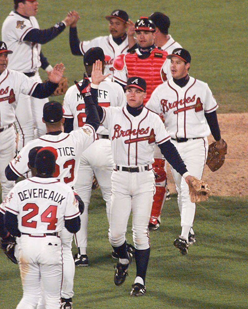 The Atlanta Braves celebrate after beating the Cleveland Indians 3-2 in Game 1 of the World Series Saturday, Oct. 21, 1995, in Atlanta. The Braves take a 1-0 lead in the best-of-seven series. (Hans Deryk/AP)