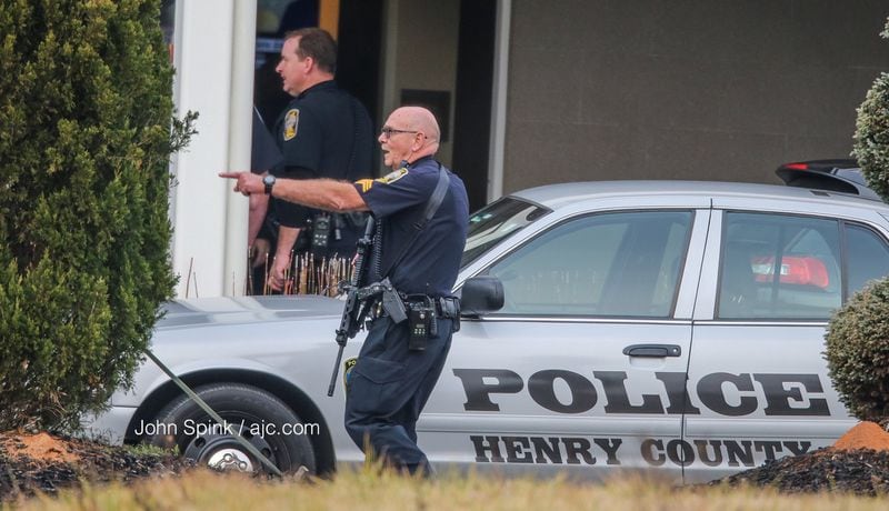 Henry County police are investigating after an armed man walked into the Home2 Suites by Hilton near McDonough with firearms. JOHN SPINK / JSPINK@AJC.COM