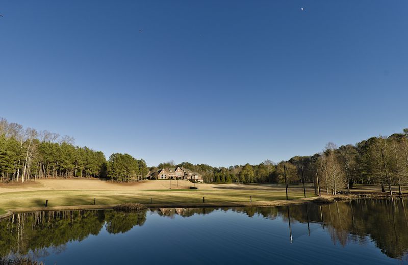 Former Atlanta Braves pitcher John Smoltz is selling his $7.2 million estate, located on 19.7 acres in the gated Greystone community in Milton. According to the listing by Harry Norman Realtors, the 18,000-square-foot home includes 10 bedrooms, 10 bathrooms, an au pair suite, a studio apartment and an eight-car garage. The property also features a custom-designed 18-hole golf course, tennis and basketball courts, a pool and spa, baseball and football fields, a fishing pond and a jogging trail.