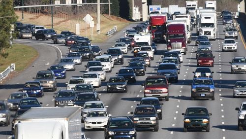 January 13, 2016 Atlanta - Traffic was jammed on I-285 westbound near Ashford-Dunwoody Road exit on Wednesday afternoon, January 13, 2016. A new 10-year plan unveiled this week by Gov. Nathan Deal included billions of dollars for toll lanes along I-285 and Ga. 400, which would create a seamless interstate network of toll lanes along northern suburbs. HYOSUB SHIN / HSHIN@AJC.COM