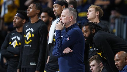 Denver Nuggets head coach Michael Malone looks on as time runs out in the second half of Game 7 of an NBA second-round playoff series against the Minnesota Timberwolves Sunday, May 19, 2024, in Denver. (AP Photo/David Zalubowski)