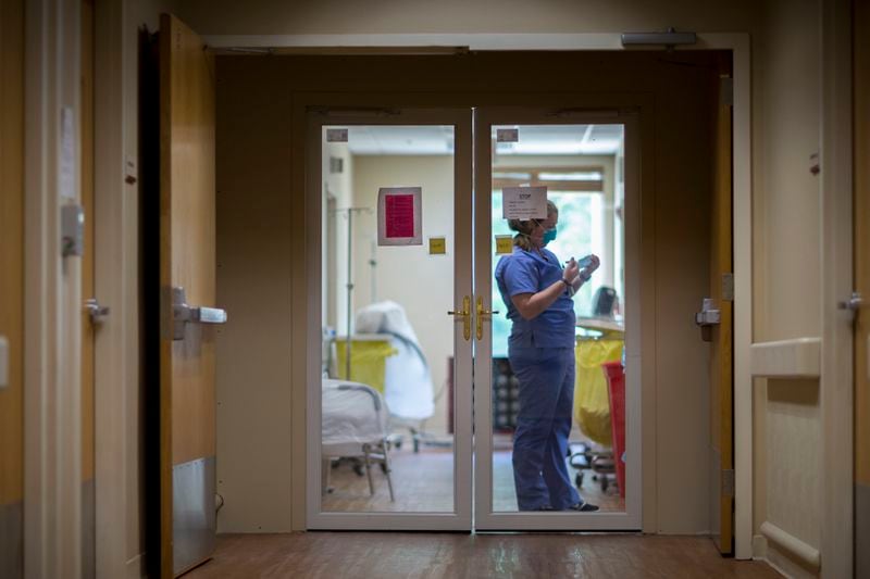 A staff member at Emanuel Medical Center in Swainsboro works in a special unit in 2020.

